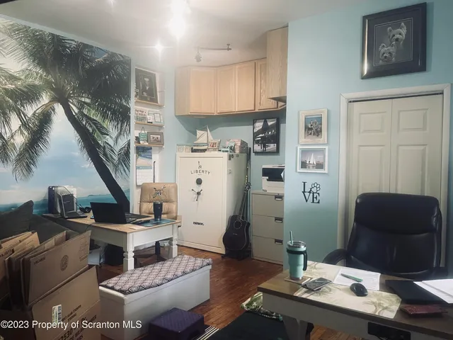 a room with furniture and a window