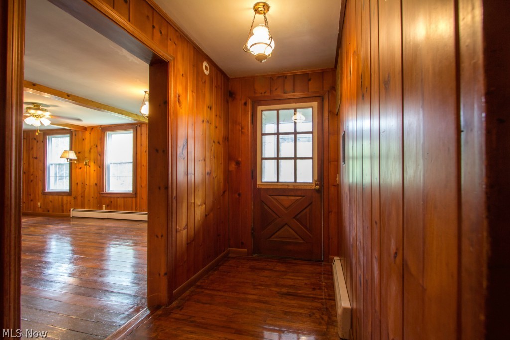 5892 Taylor Road Painesville, OH 44077 - Photo 8 of 25 Step into this charming, wood paneled Heritage Home - bountiful with character.