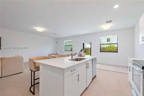 a view of kitchen with appliances