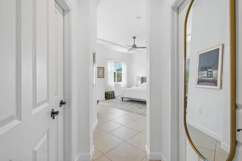 a view of walk in closet with clothes