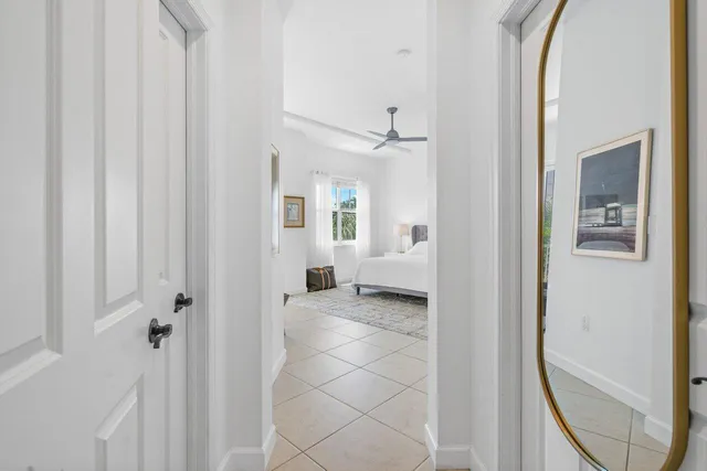 a view of walk in closet with clothes