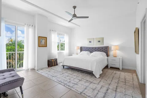 a bedroom with a bed and a table in it