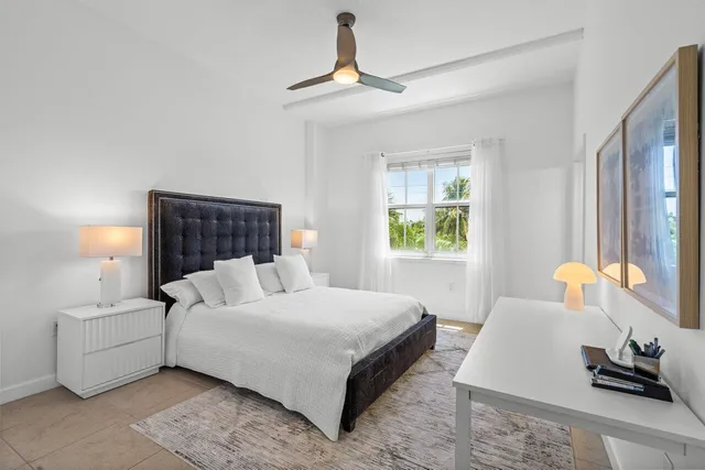 a view of a palm trees in front of a building