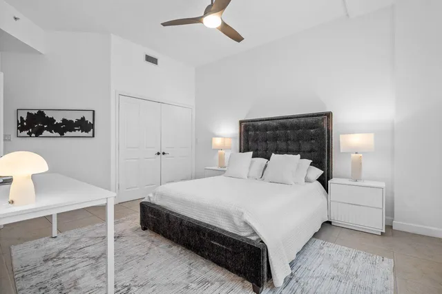 a view of swimming pool with a lounge chair