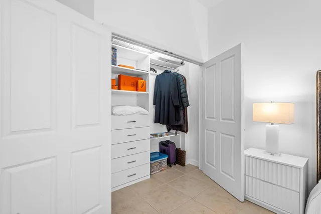 a room with gym equipment and a large window