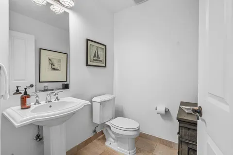 a view of a balcony with chairs