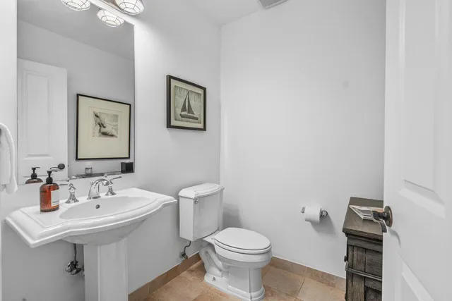 a view of a balcony with chairs