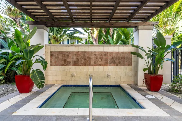 a outdoor living space with furniture and a potted plant