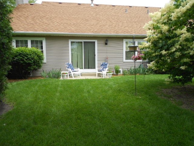 454 Prairieview Drive Oswego, IL 60543 - Photo 2 of 14 a house that has garden in front of it