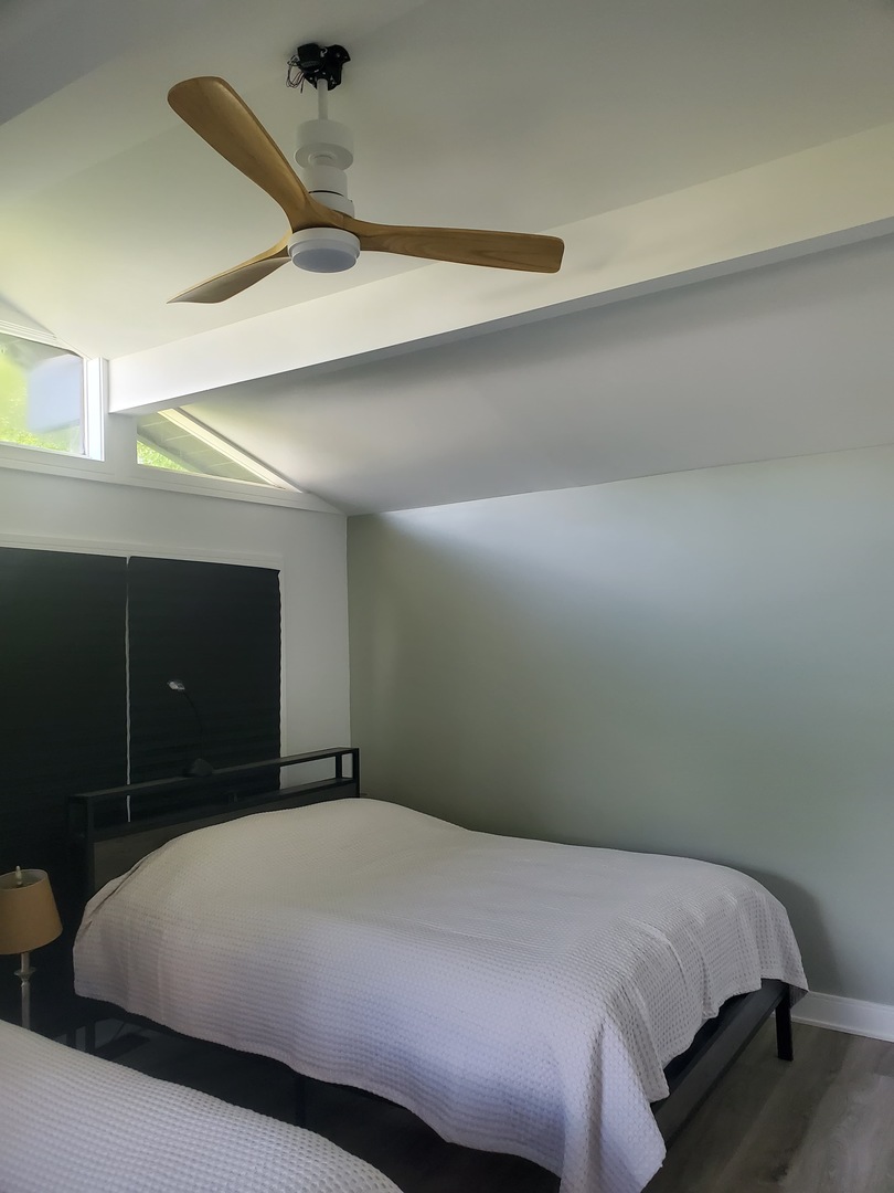 4-a94 Springfield Drive Apple River, IL 61001 - Photo 24 of 35 a bedroom with a bed and a ceiling fan