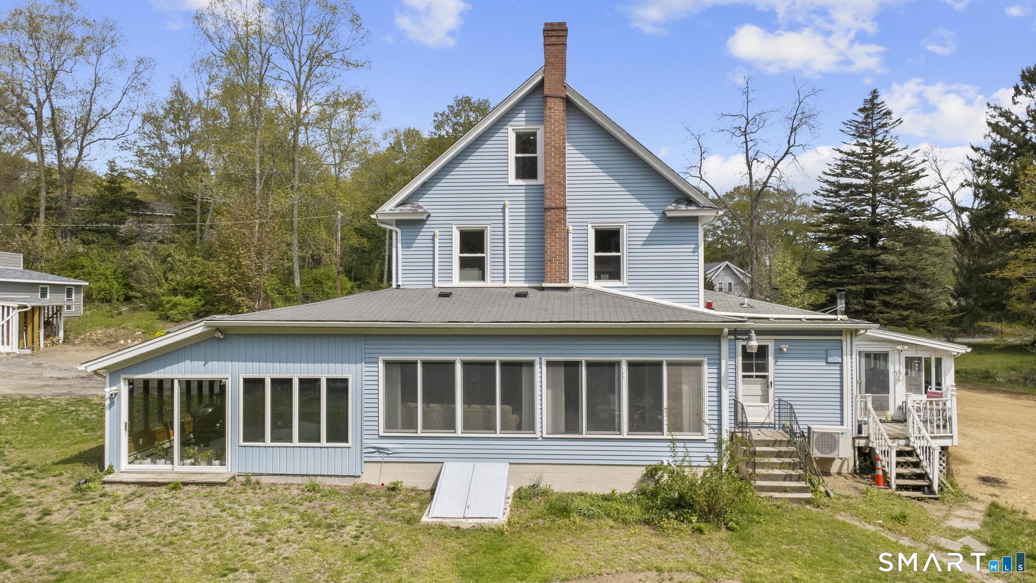 15 Pent Road Deep River, CT 06417 - Photo 5 of 36 a front view of a house with a yard