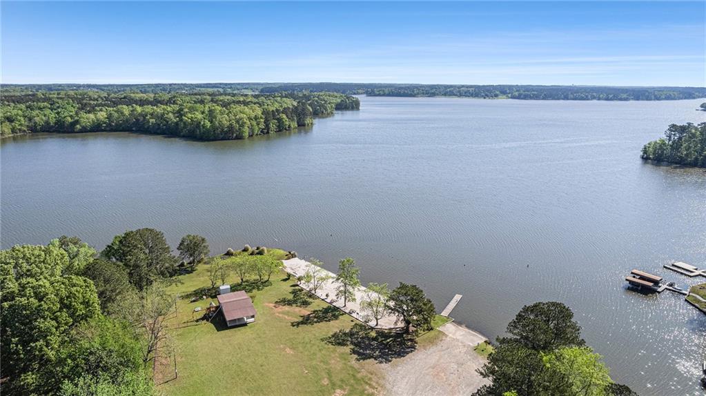 0 Oconee Circle Eatonton, GA 31024 - Photo 1 of 19 a view of a lake with a mountain