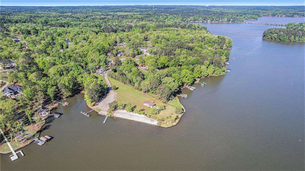 0 Oconee Circle Eatonton, GA 31024 - Photo 18 of 19 an aerial view of a house with a yard and lake view