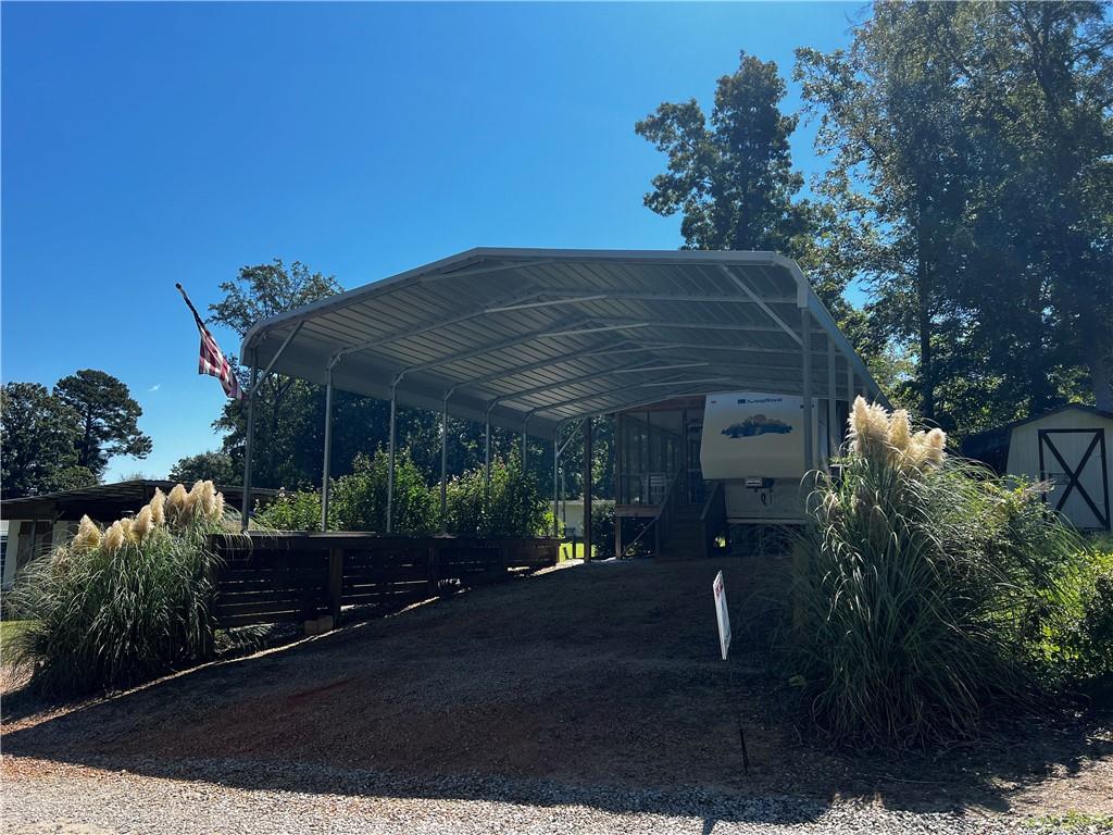 0 Oconee Circle Eatonton, GA 31024 - Photo 4 of 19 a view of a house with a street