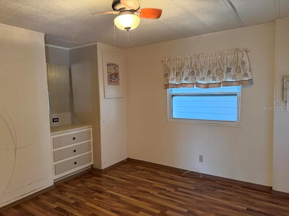 5168 Rubber Tree Circle New Port Richey, FL 34653 - Photo 14 of 36 a view of a livingroom with wooden floor