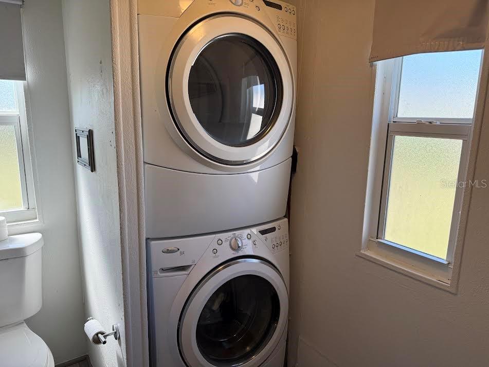 5168 Rubber Tree Circle New Port Richey, FL 34653 - Photo 18 of 36 a utility room with dryer and washer