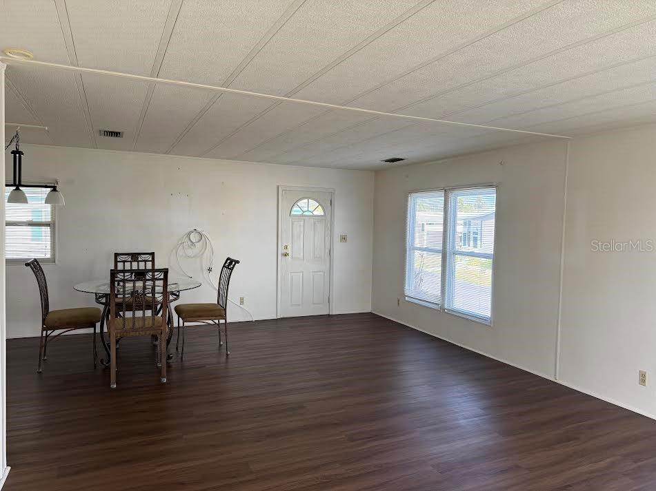 5168 Rubber Tree Circle New Port Richey, FL 34653 - Photo 25 of 36 a view of a livingroom with furniture and wooden floor