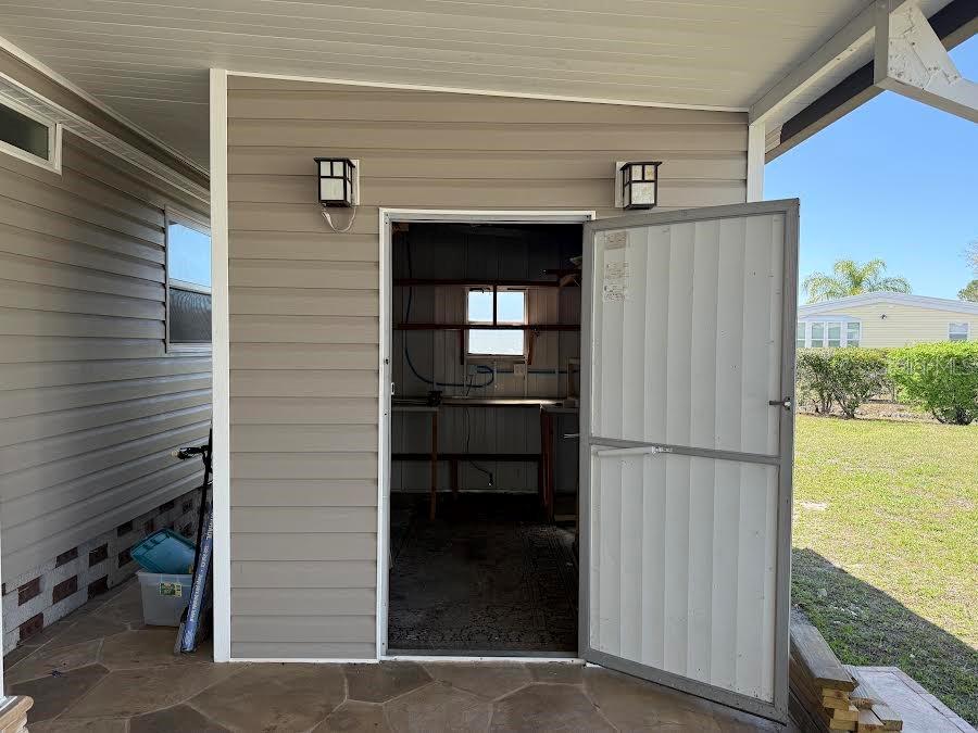 5168 Rubber Tree Circle New Port Richey, FL 34653 - Photo 28 of 36 a view of outdoor space and a car garage