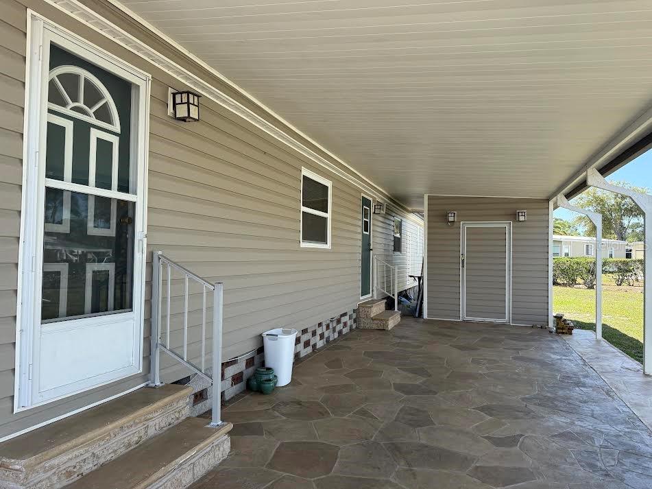 5168 Rubber Tree Circle New Port Richey, FL 34653 - Photo 3 of 36 a view of an entryway of the house