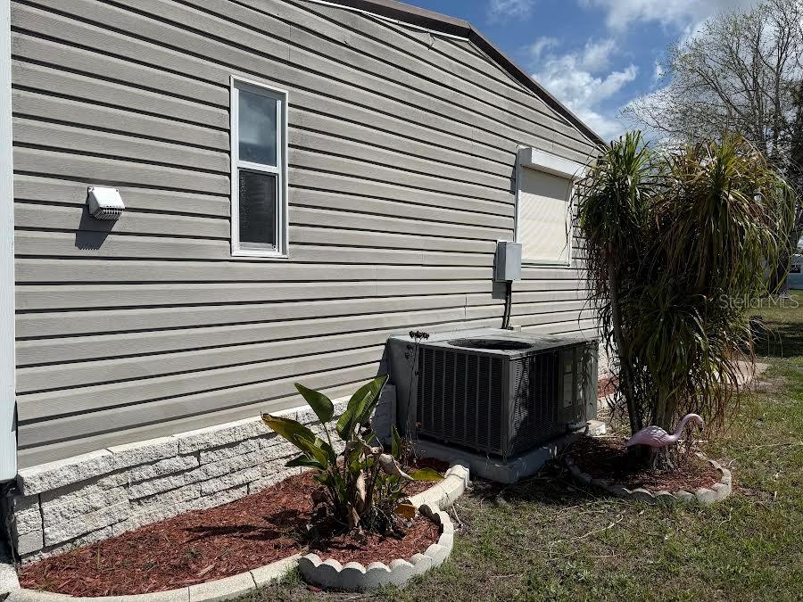 5168 Rubber Tree Circle New Port Richey, FL 34653 - Photo 31 of 36 a view of a backyard