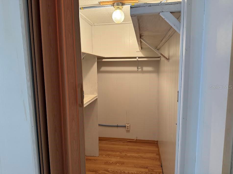 5168 Rubber Tree Circle New Port Richey, FL 34653 - Photo 10 of 36 a bathroom with a mirror