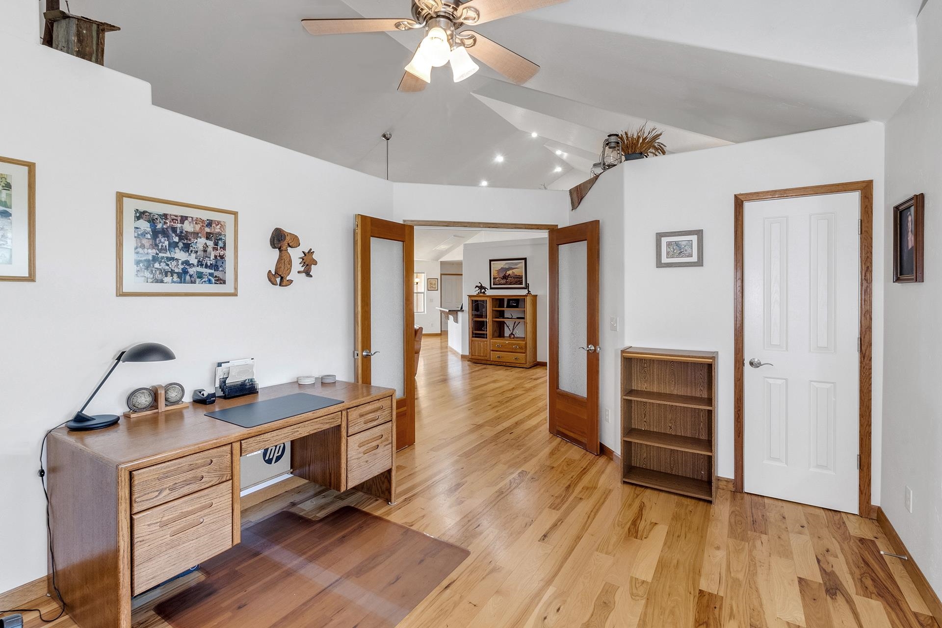 2302 Outback Ridge Road Grand Junction, CO 81505 - Photo 24 of 42 a room with furniture and wooden floor