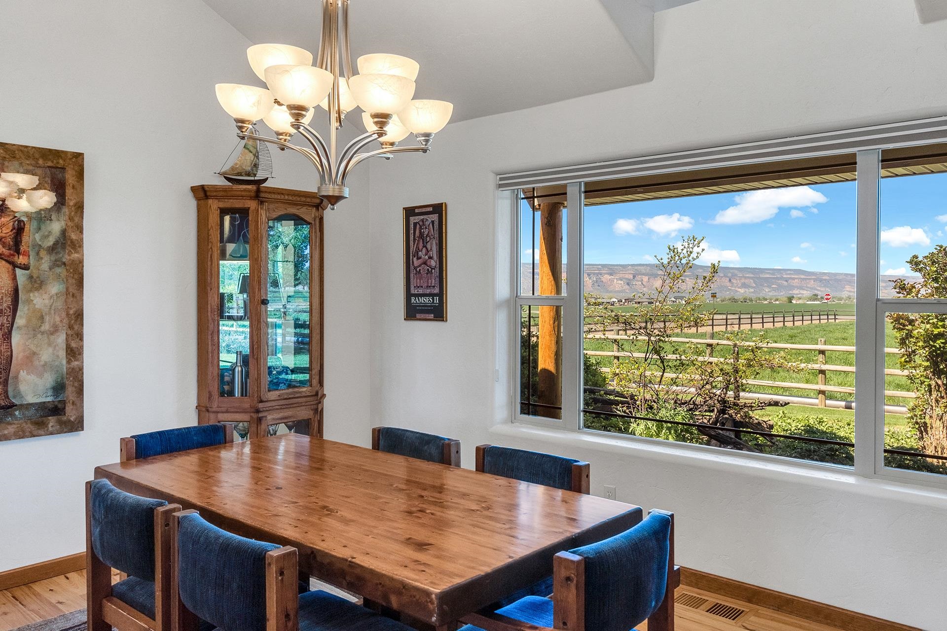 2302 Outback Ridge Road Grand Junction, CO 81505 - Photo 28 of 42 a view of a dining room with furniture window and outside view