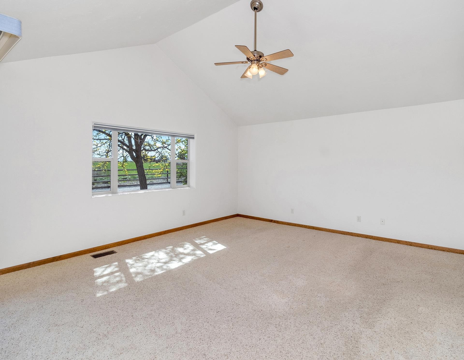 2302 Outback Ridge Road Grand Junction, CO 81505 - Photo 29 of 42 a view of an empty room with a window