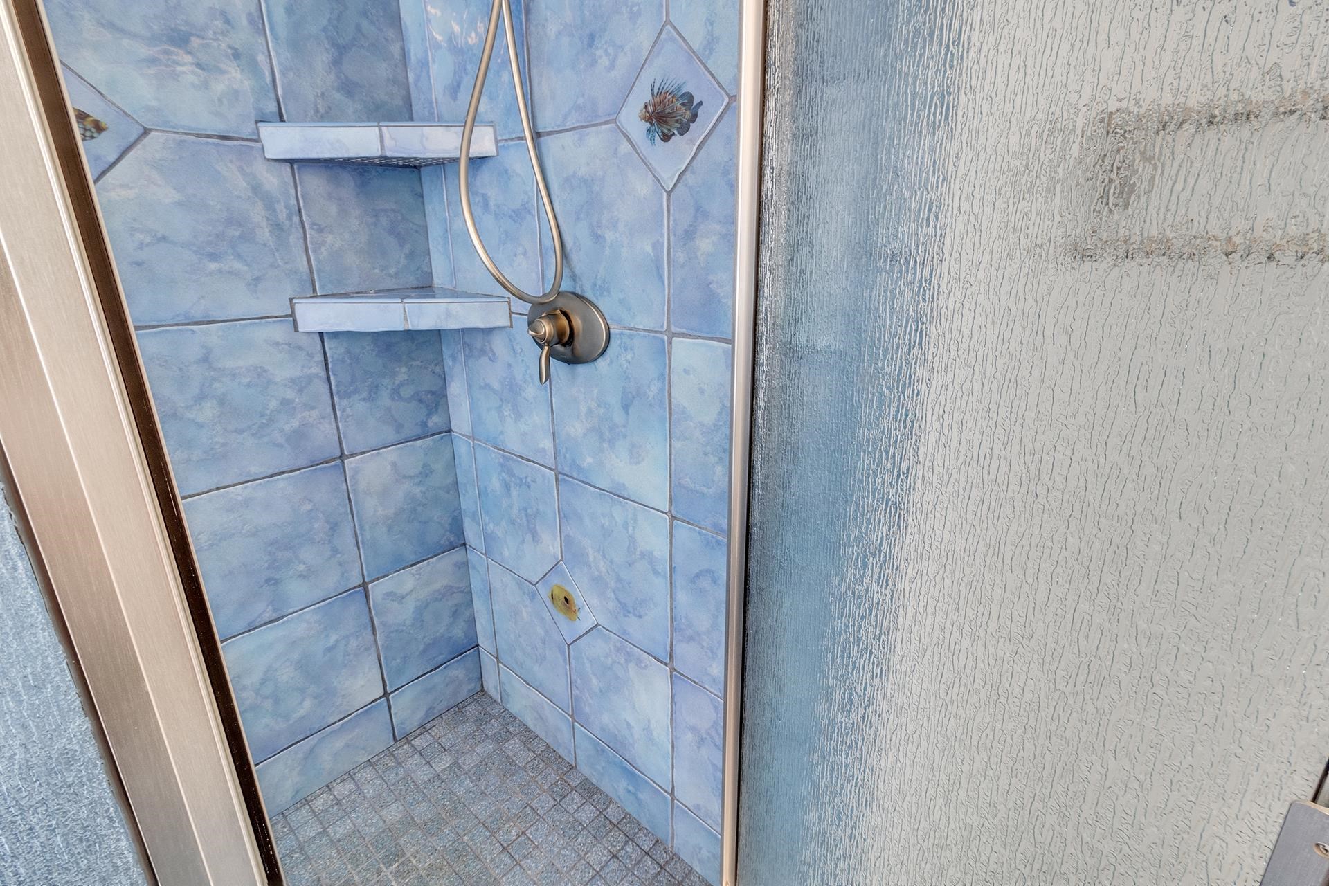 2302 Outback Ridge Road Grand Junction, CO 81505 - Photo 32 of 42 a bathroom with a shower