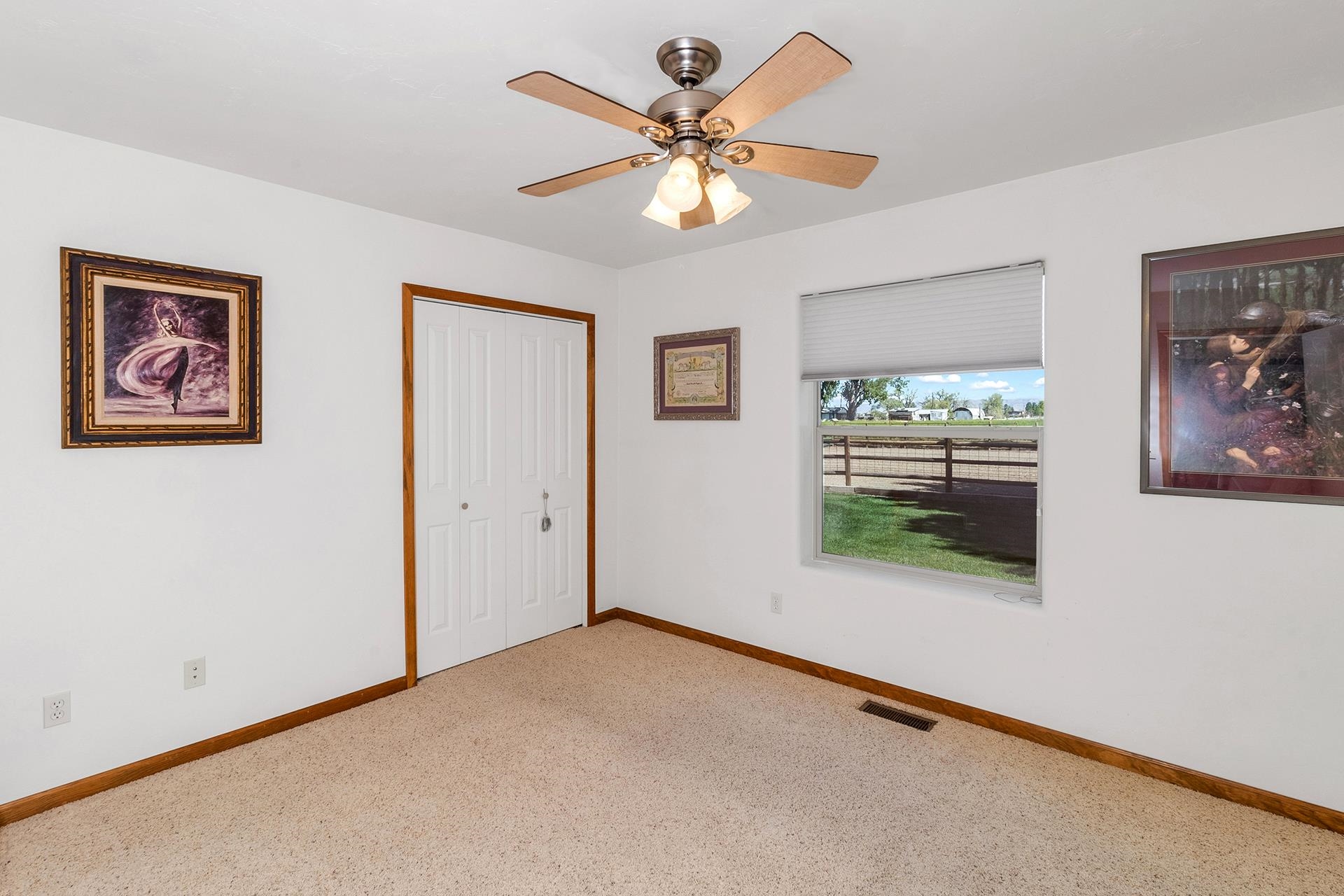 2302 Outback Ridge Road Grand Junction, CO 81505 - Photo 36 of 42 a view of an empty room with a window