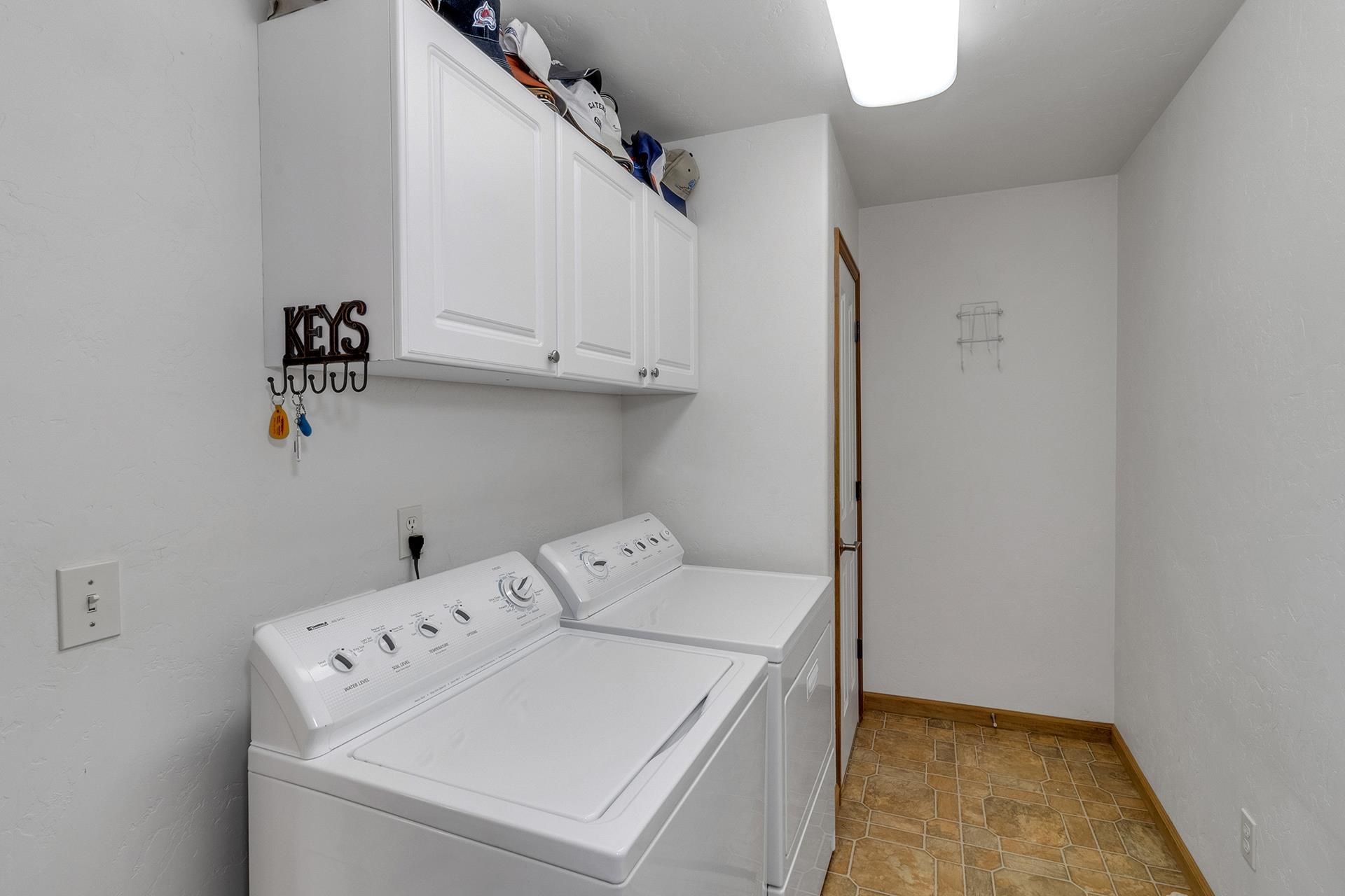 2302 Outback Ridge Road Grand Junction, CO 81505 - Photo 37 of 42 a utility room with dryer and washer