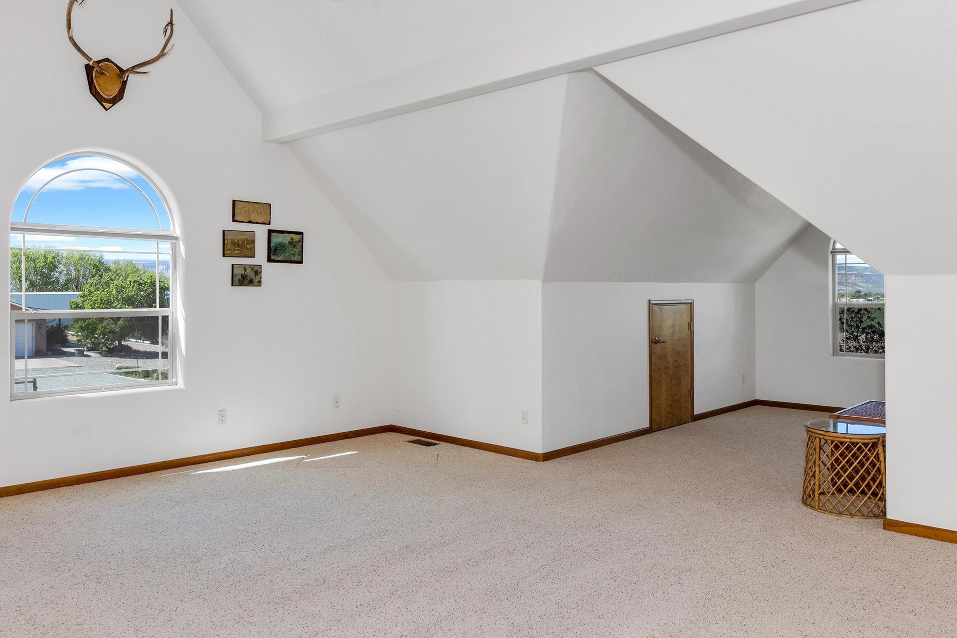 2302 Outback Ridge Road Grand Junction, CO 81505 - Photo 41 of 42 a view of an empty room with a window