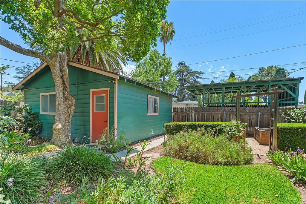 3892 Oakwood Place Riverside, CA 92506 - Photo 31 of 36 The structure beyond the back fence is a shaded RV parking area off of the back alley.