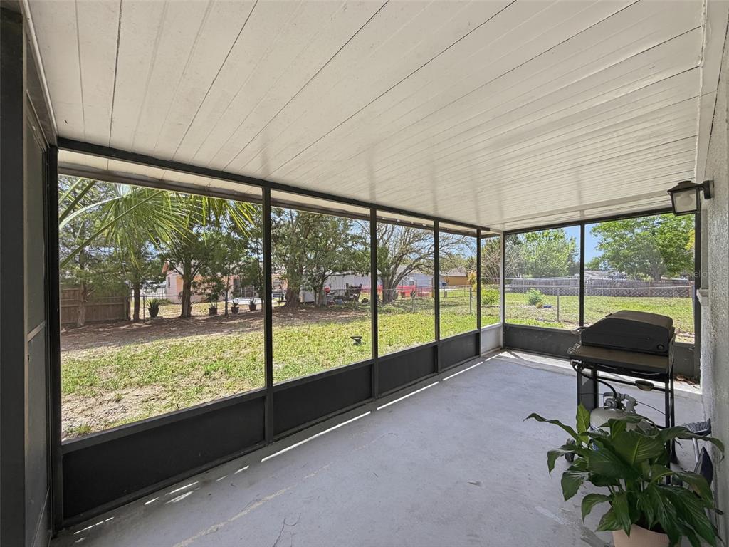 5384 Baldock Avenue Spring Hill, FL 34608 - Photo 38 of 51 a view of a room with a large window and sitting area