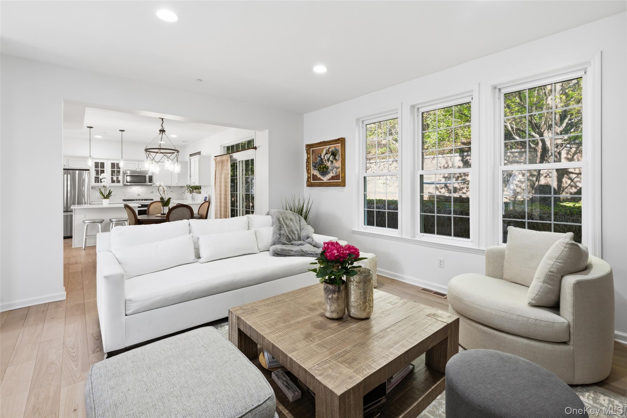 40 Bellefair Road Rye Brook, NY 10573 - Photo 40 of 43 Family room showcasing the modern open floor plan and sliders that lead to the rear yard and patio