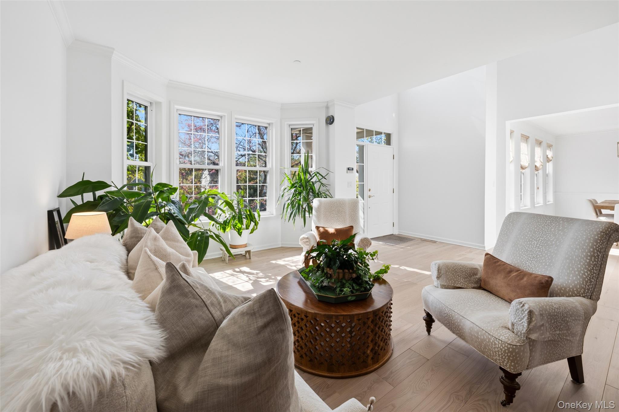 40 Bellefair Road Rye Brook, NY 10573 - Photo 4 of 43 Views of the entry foyer and Living room with stunning hardwood floors throughout