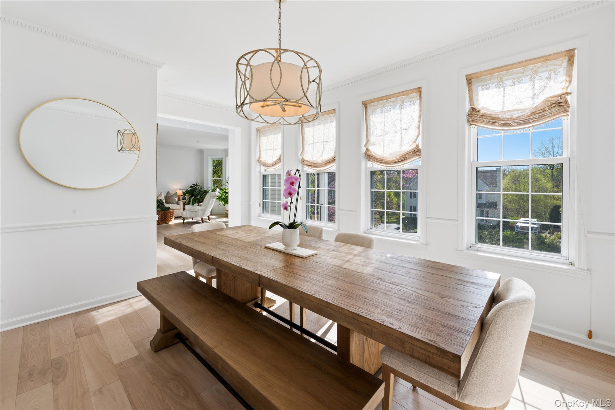 40 Bellefair Road Rye Brook, NY 10573 - Photo 5 of 43 Expansive Dining room with gorgeous hardwood floors and walls of windows