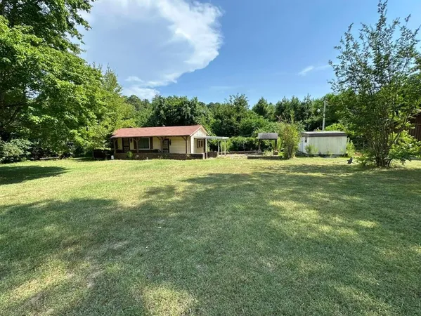 a front view of house with yard