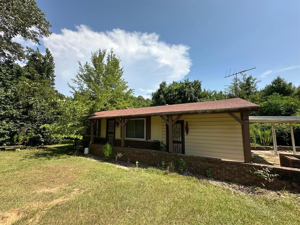 1219 Canal Street Ringgold, LA 71068 - Photo 14 of 14 a front view of house with yard