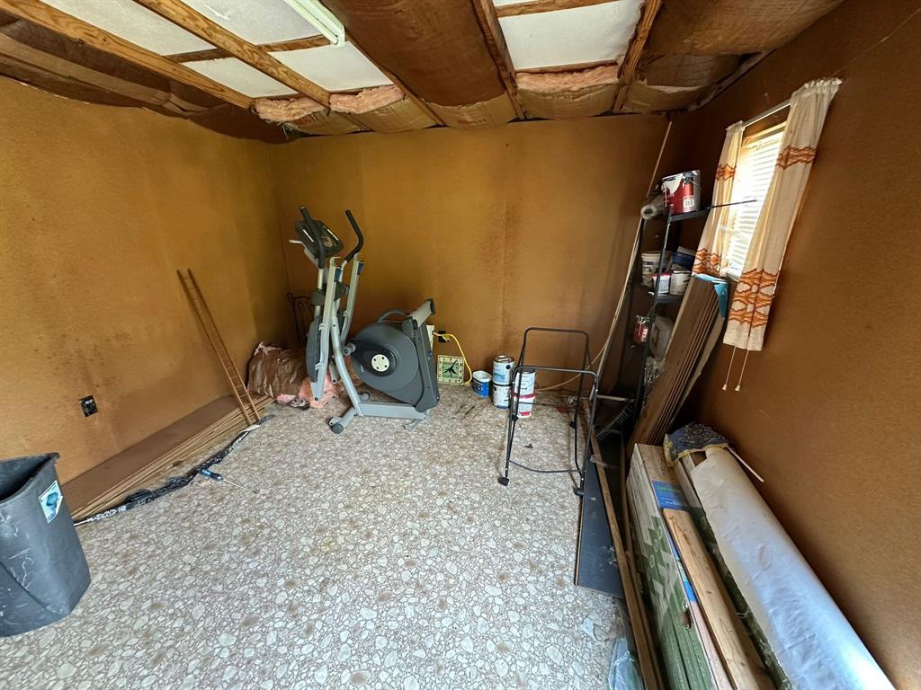 1219 Canal Street Ringgold, LA 71068 - Photo 4 of 14 a view of a room with gym equipment