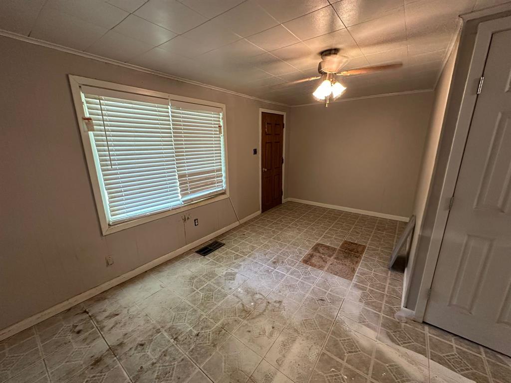 1219 Canal Street Ringgold, LA 71068 - Photo 6 of 14 a view of an empty room with a window