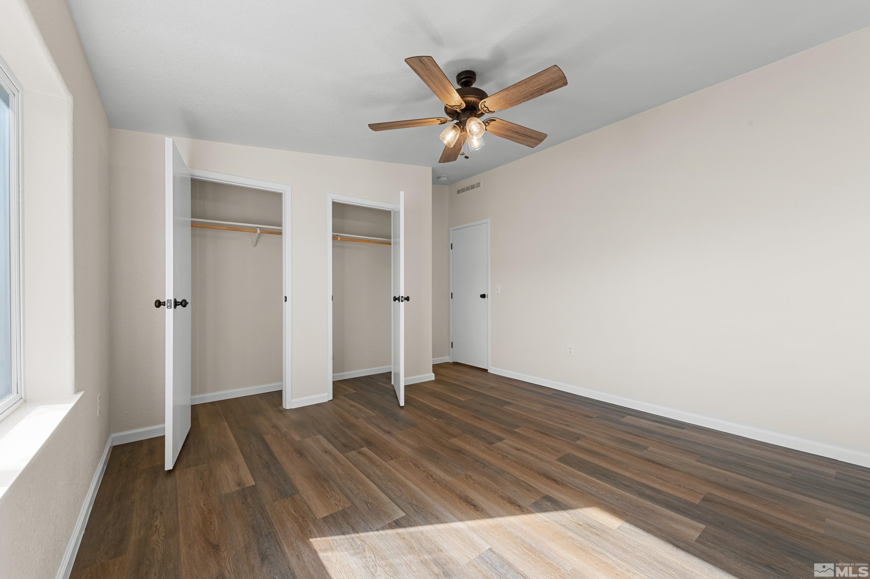 10 Rodeo Drive Reno, NV 89508 - Photo 22 of 37 wooden floor in an empty room with a window