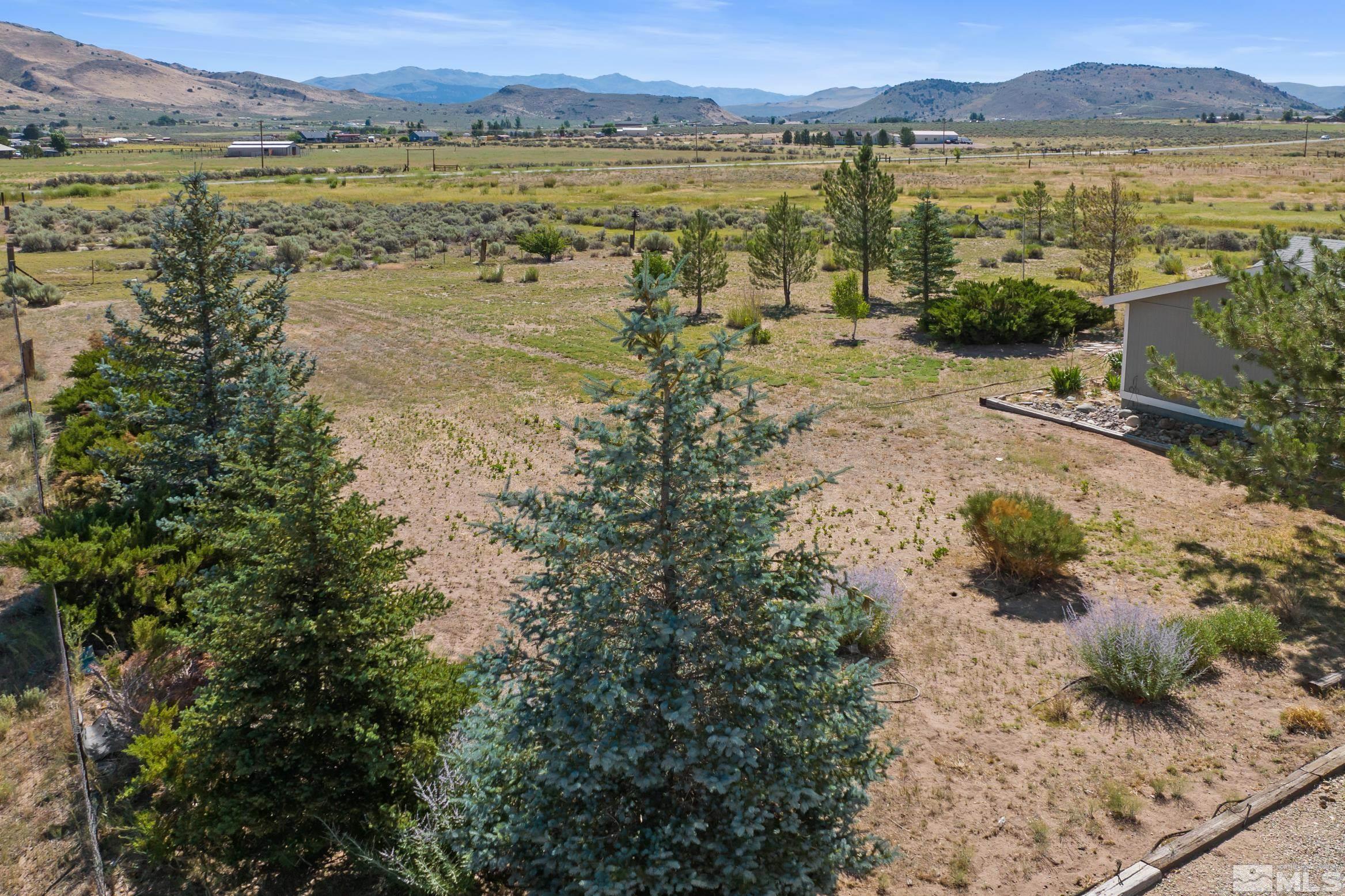 10 Rodeo Drive Reno, NV 89508 - Photo 27 of 37 a view of a lake with mountain in the background