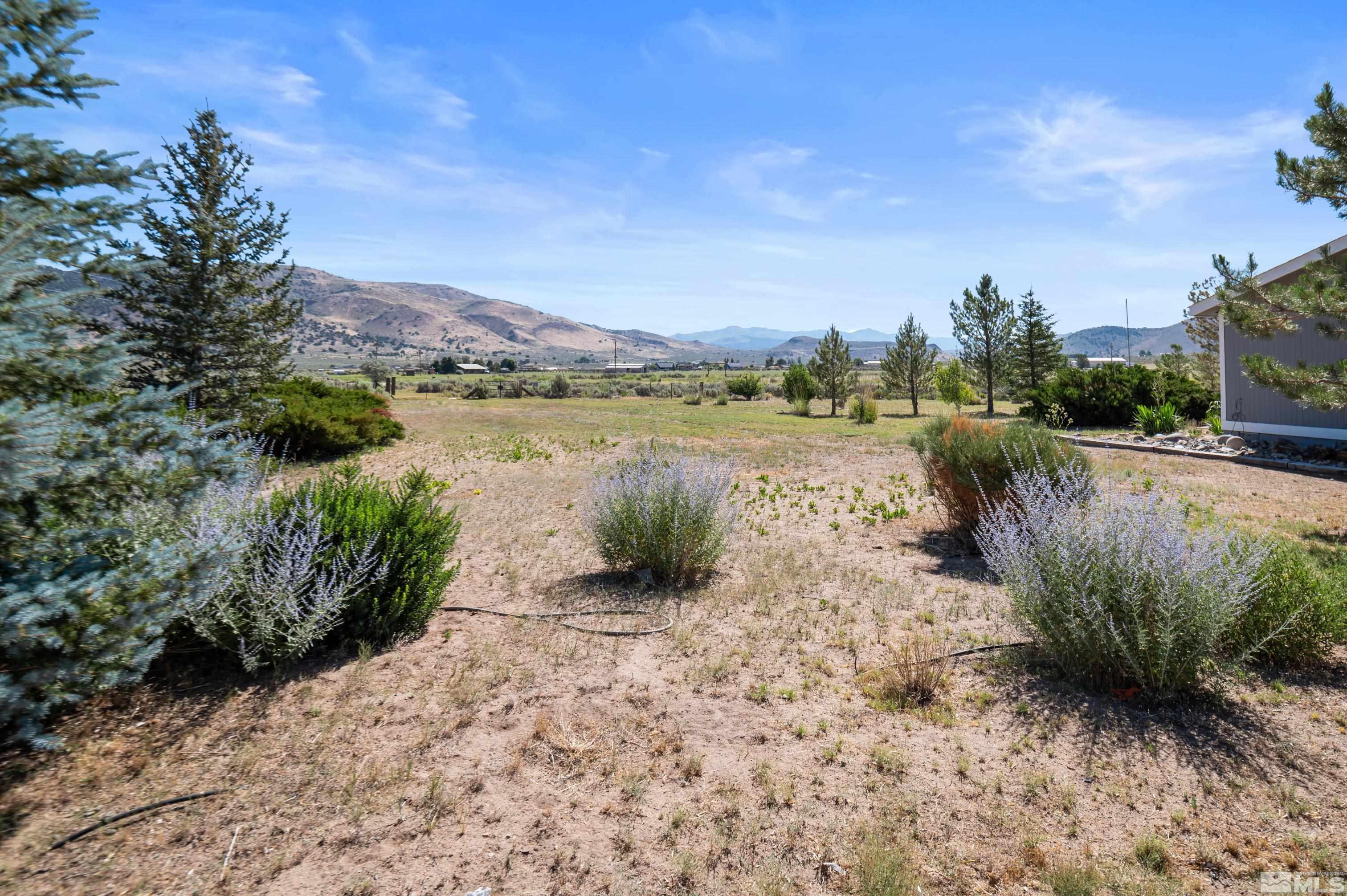 10 Rodeo Drive Reno, NV 89508 - Photo 28 of 37 a view of a lake with a mountain in the background