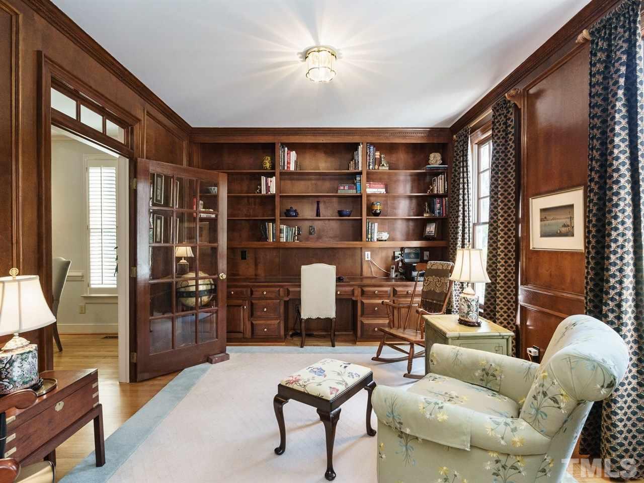 3100 White Oak Road Raleigh, NC 27609 - Photo 4 of 25 a living room with furniture a lamp and a window