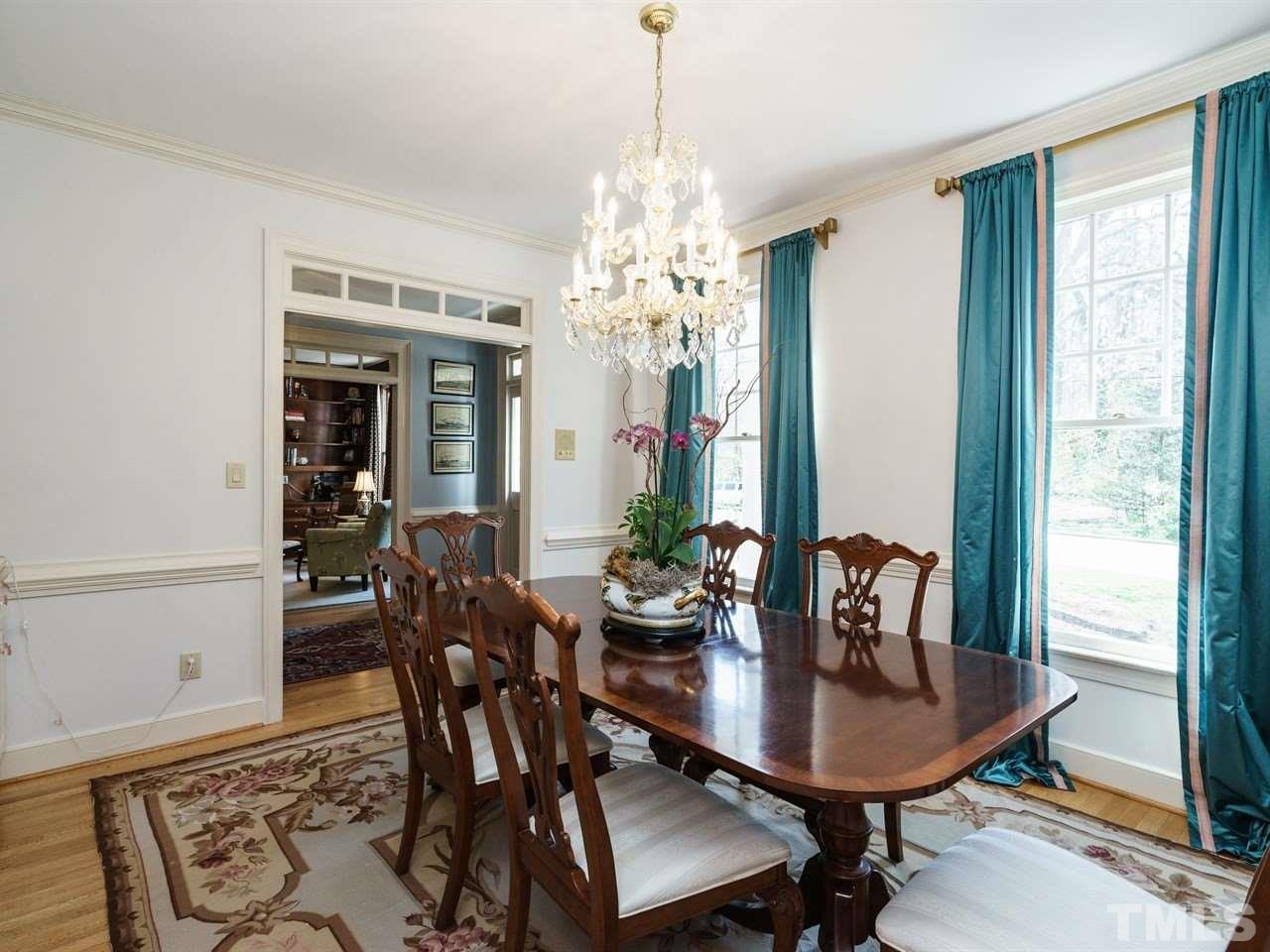 3100 White Oak Road Raleigh, NC 27609 - Photo 5 of 25 a view of a dining room with furniture and window