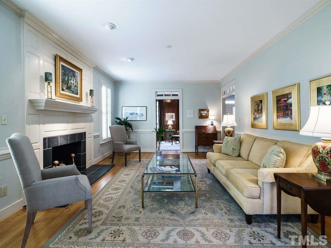 3100 White Oak Road Raleigh, NC 27609 - Photo 7 of 25 a living room with furniture and a fireplace