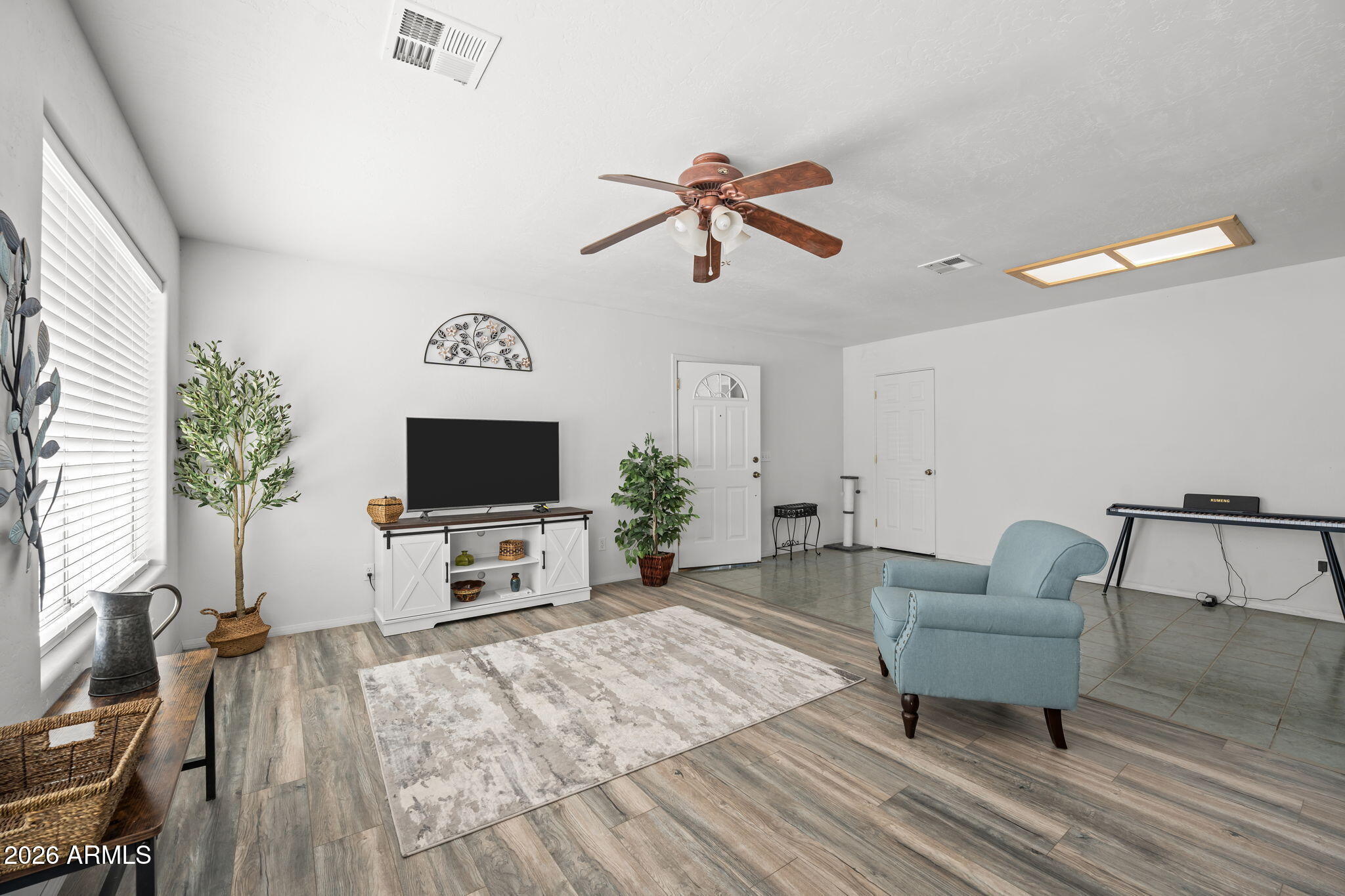 27144 Bennett Way Congress, AZ 85332 - Photo 7 of 33 a living room with furniture and a flat screen tv