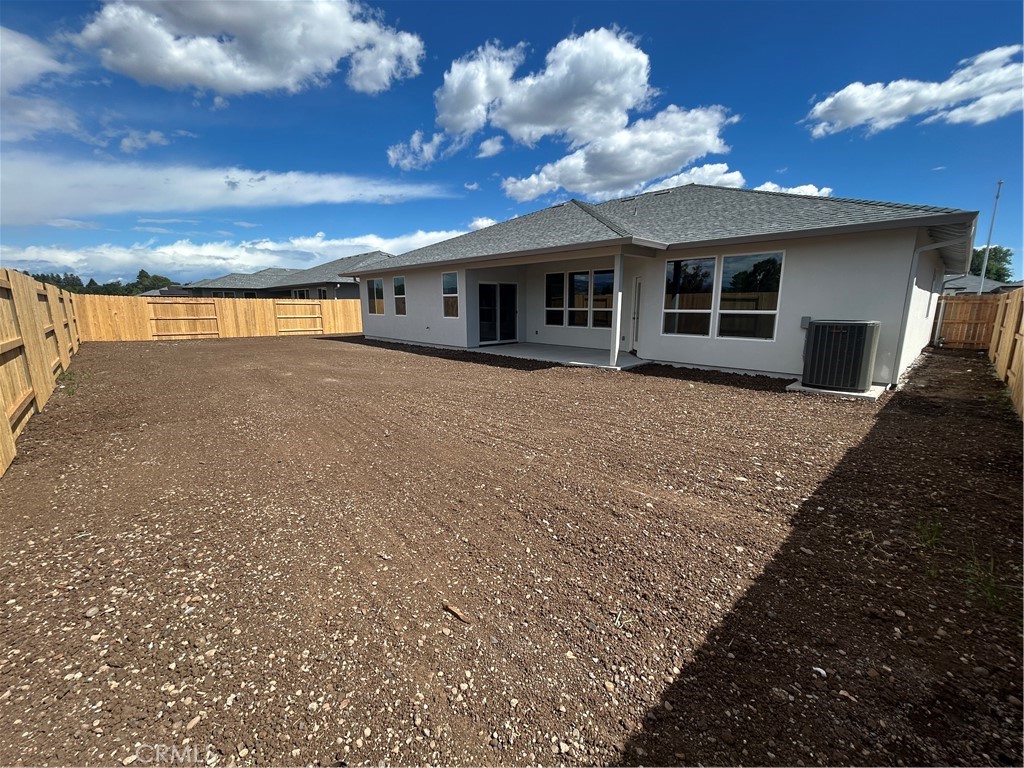 325 Bainbridge Place Chico, CA 95973 - Photo 24 of 26 a front view of a house with a yard