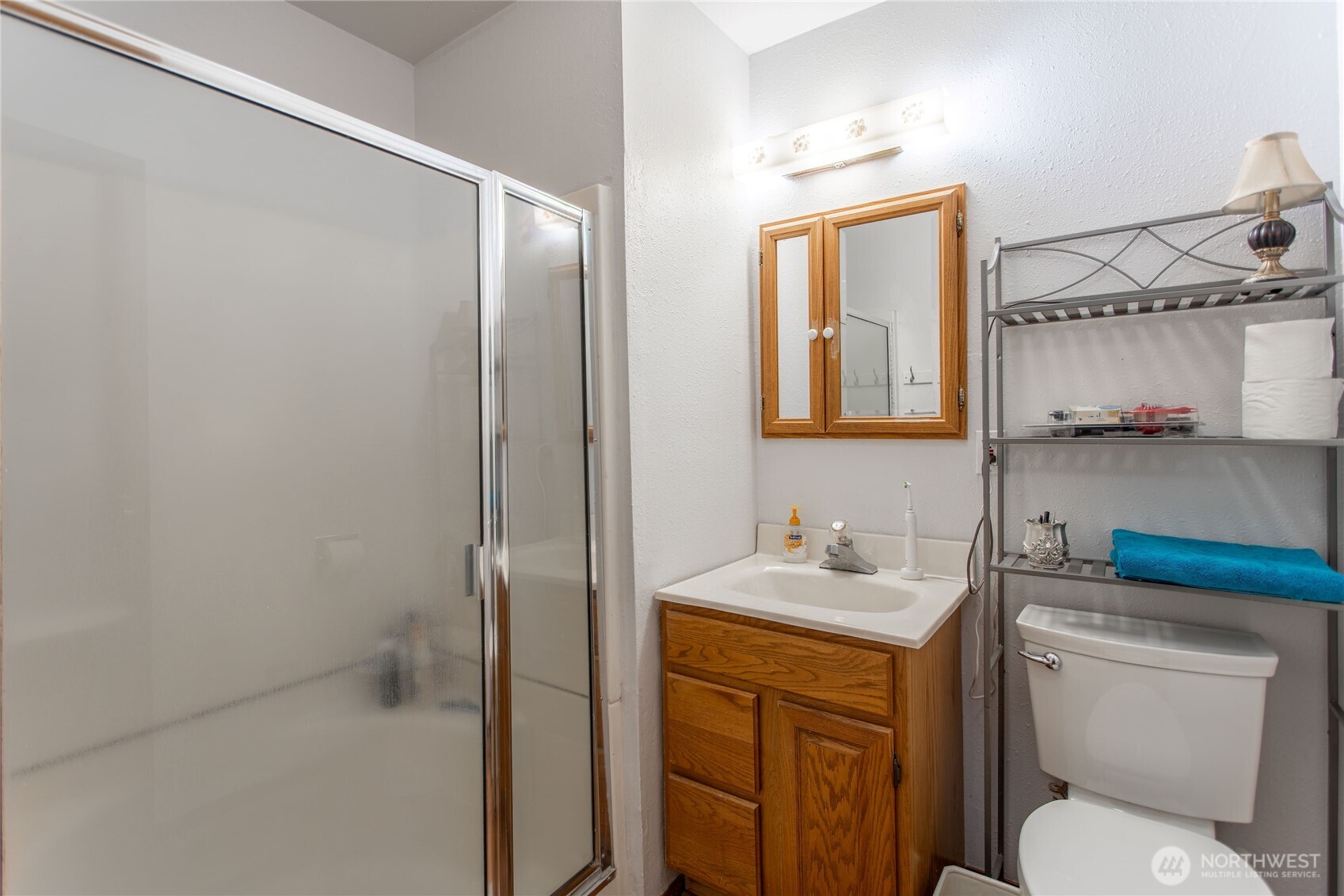 371 Pigeon Springs Road Onalaska, WA 98570 - Photo 12 of 39 a bathroom with a toilet sink and mirror